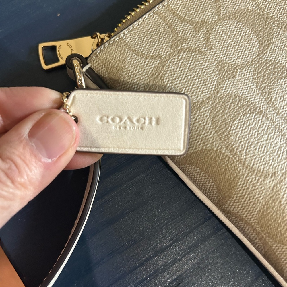 COACH - Mini Rowan File Bag In Signature Canvas (never used)